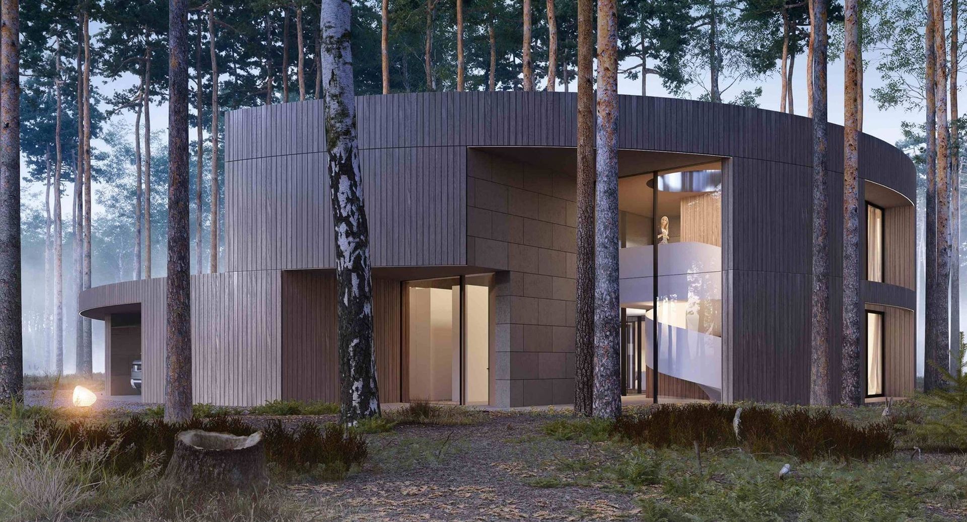 Nowoczesny dom, który stapia się z lasem. Otoczony przez drzewa i sam je otaczający